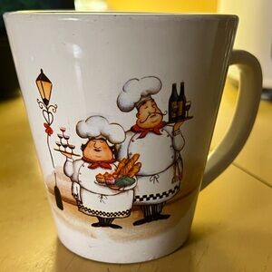 Trisa coffee mug with a French chef design Ceramic
And Porcelain